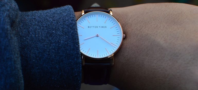 A person wearing a wrist watch.