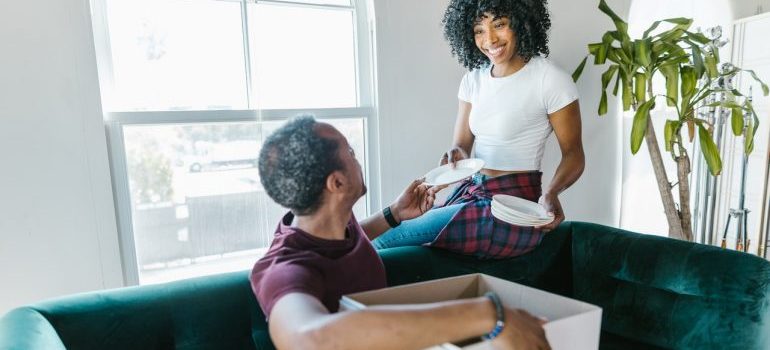couple having a pleasant relocation with the help of movers in Potomac MD
